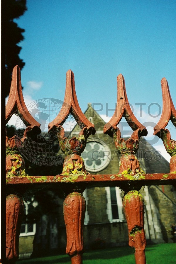 0186 Church Behind Fence, Ireland