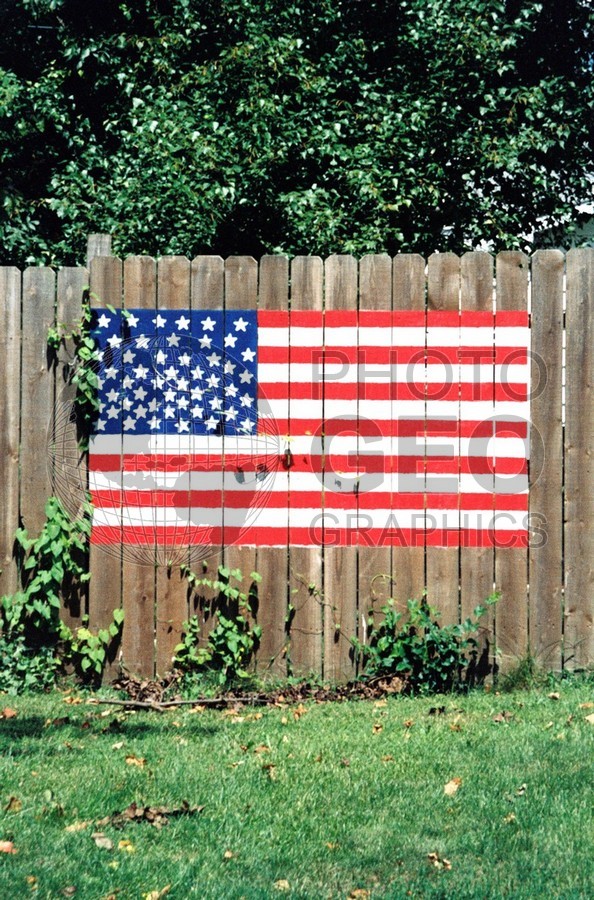 1447 American Flag on Fence, Peru. IL