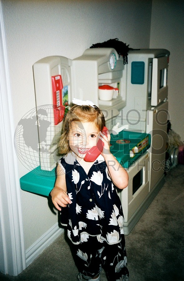 5129 Girl with Black & White Dress on Telephone