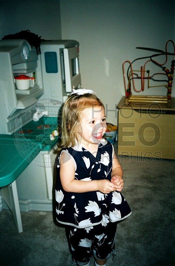 5130 Girl with Black & White Dress on Telephone