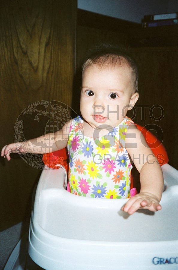 5158 Baby in High Chair