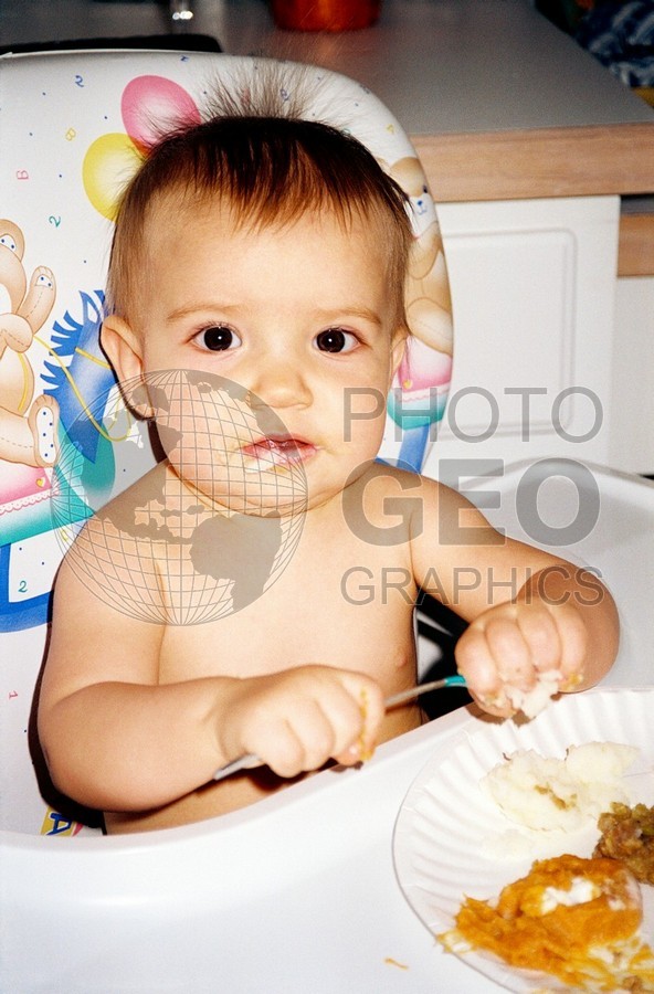 5166 Baby in High Chair