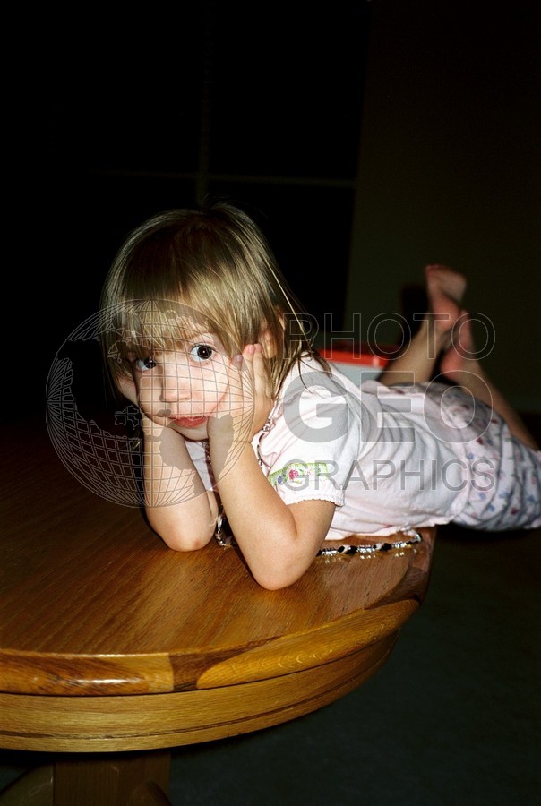 5209 Girl Leaning on Table