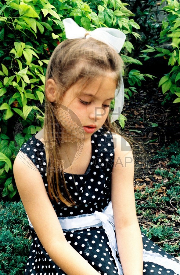 5307 Young Girl with Black Dress with White Polka Dots